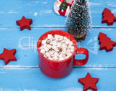 hot chocolate with marshmallow in a red ceramic mug