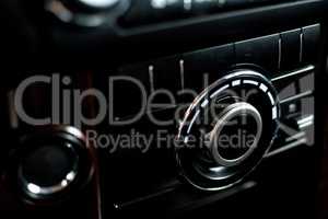 Photo of dashboard of car, Interior View of the modern business car, detail. Closeup fashion image.