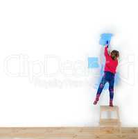 girl paints a wall
