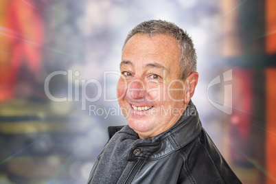 Portrait of a man with leather jacket and scarf