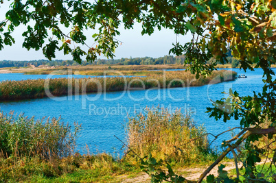 the fishermen on the boat, lake or pond for fishing, the scenery is beautiful pond