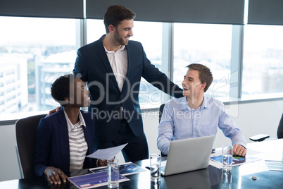 Executives interacting with each other