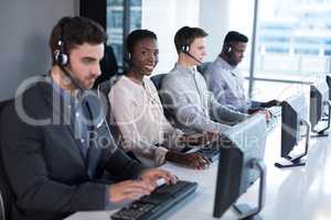 Customer service executives working at office