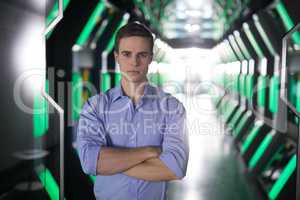 Male executive standing in futuristic office