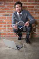 Executive holding a document in the office