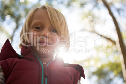 Portrait of little girl in the forest