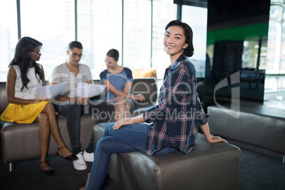 Portrait of smiling female executive in office