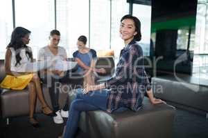 Portrait of smiling female executive in office