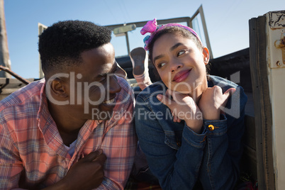 Couple interacting with each other in car