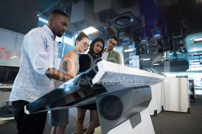 Business executives touching digital screen