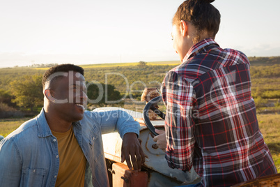 Couple interacting with each other at countryside