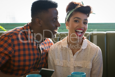 Couple having fun in restaurant