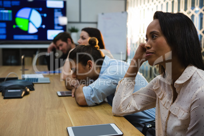 Business colleagues relaxing in conference room