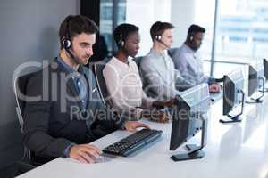 Customer service executives working at office
