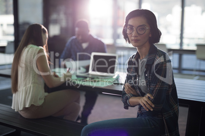 Female executive sitting in office