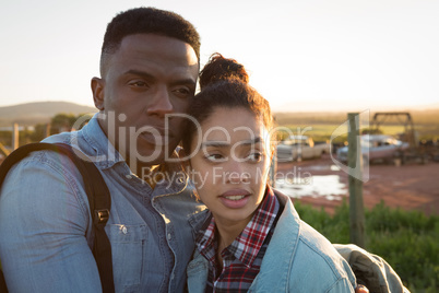 Couple embracing each other on a sunny day