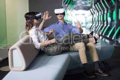 Couple using virtual reality headset