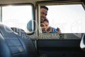 Couple embracing each other at countryside