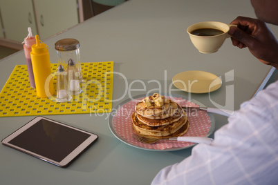 Man having coffee and breakfast