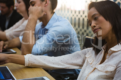 Business colleagues relaxing in conference room