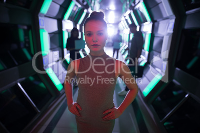 Female executive standing in futuristic office