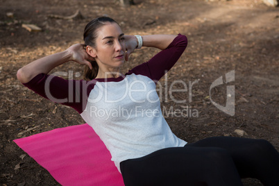 Woman working out on her mat