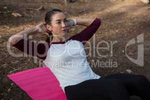 Woman working out on her mat