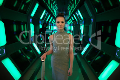 Female executive standing in futuristic office