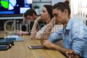 Business colleagues relaxing in conference room