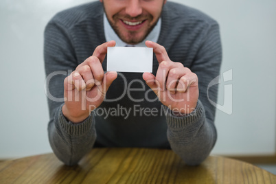 Executive showing empty business card