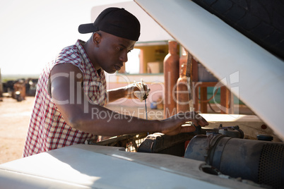 Man repairing a car