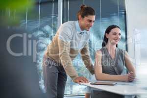 Business executives working at desk