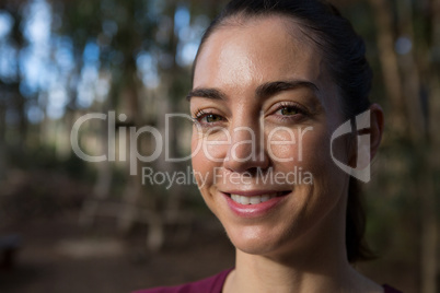 Woman face shining with bright sun light