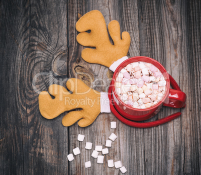 hot chocolate with marshmallow in a red mug