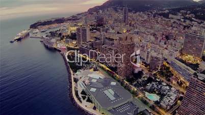 Monaco city town Monte Carlo Drone flight port yachts sea flats evening