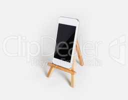 Smartphone on wooden stand