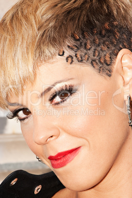 Woman leopard skin hairstyle.