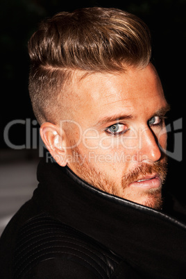 Portrait of a young man with blue eyes.