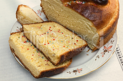 Appetizing sweet white bread on the plate.