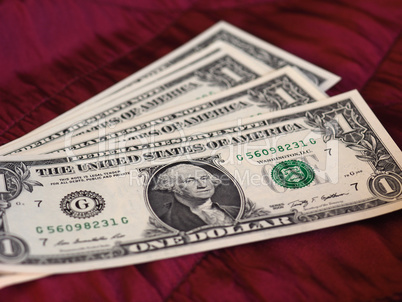 One Dollar notes, United States over red velvet background