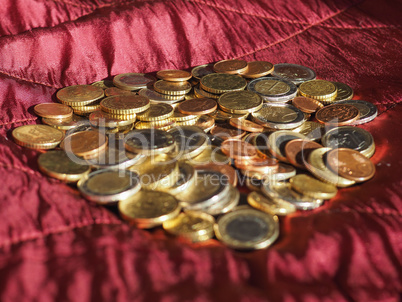 Euro coins, European Union over red velvet background