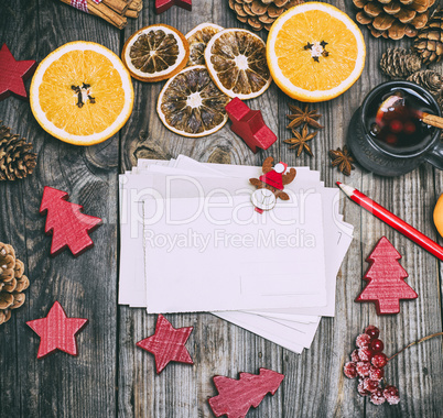 empty paper postcards on a gray wooden background