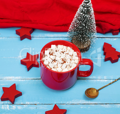 hot chocolate with marshmallow in a red ceramic mug