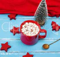 hot chocolate with marshmallow in a red ceramic mug