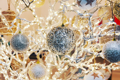 Festive Christmas background with glittering decorations and lam