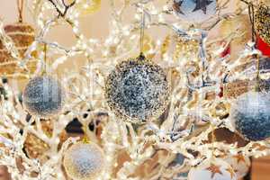Festive Christmas background with glittering decorations and lam