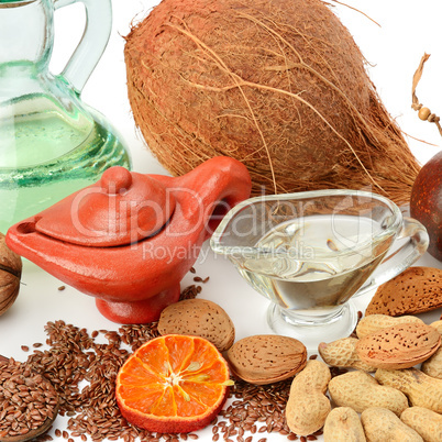 Set of seeds, nuts and vegetable oils, isolated on white .