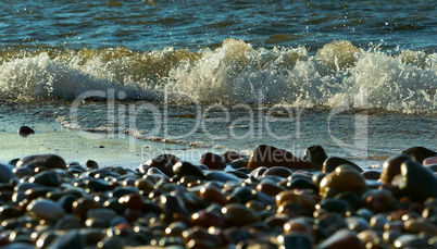 the wave breaks on the rocks, waves on the Baltic sea