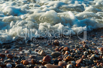 the wave breaks on the rocks, waves on the Baltic sea
