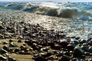 the wave breaks on the rocks, waves on the Baltic sea